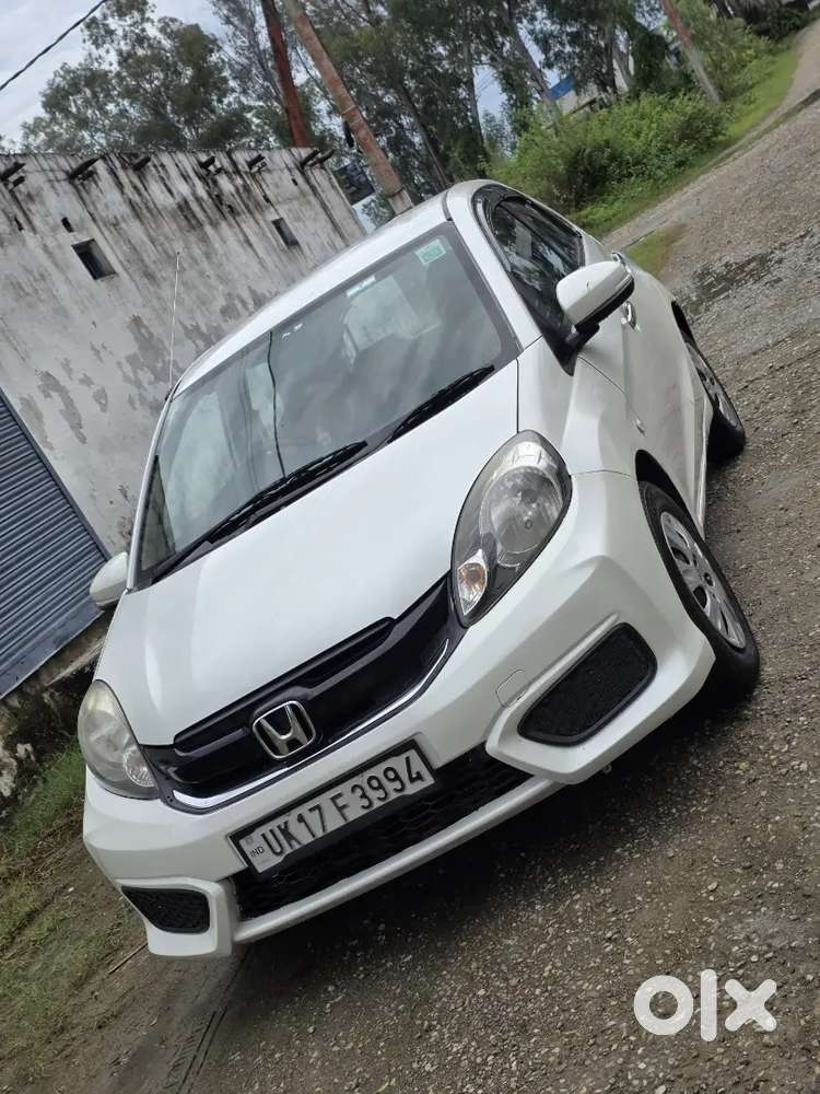 Honda Brio Smt
1st Owner 
Central Locking
