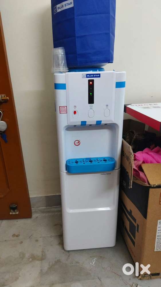 Water cooler for sale with fridge inside hot/cold water 2months old