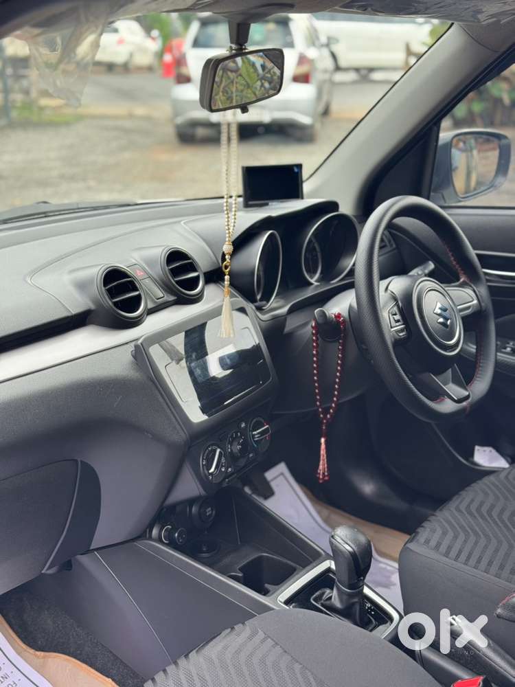 Swift 1.2 Vxi 2021 Km Driven