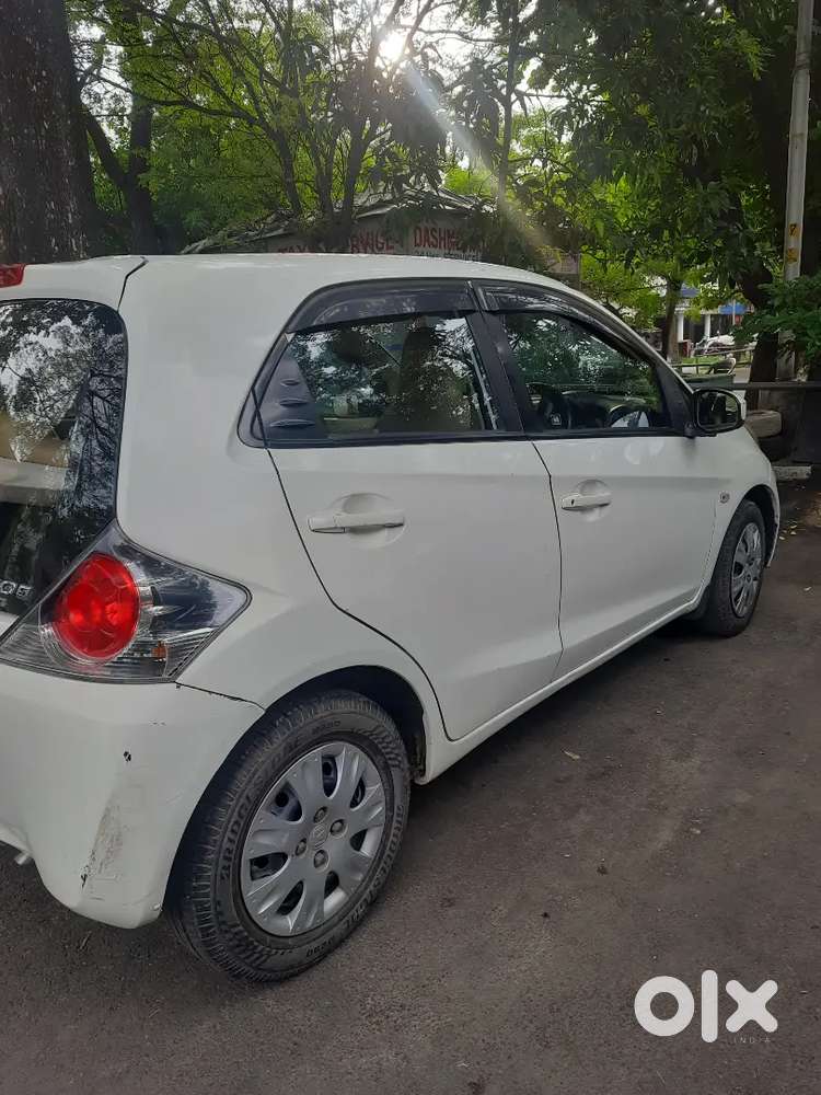 Honda Brio 2012 Petrol, Good Condition, Lady Driving