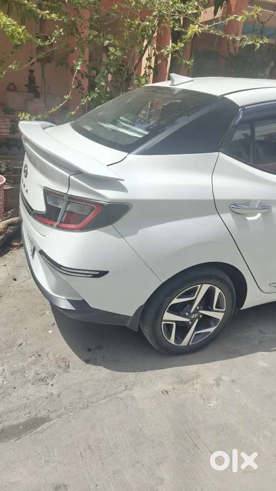 Hyundai Aura 2022 Petrol 41000 Km  Services Centre ,armrest,sunshades