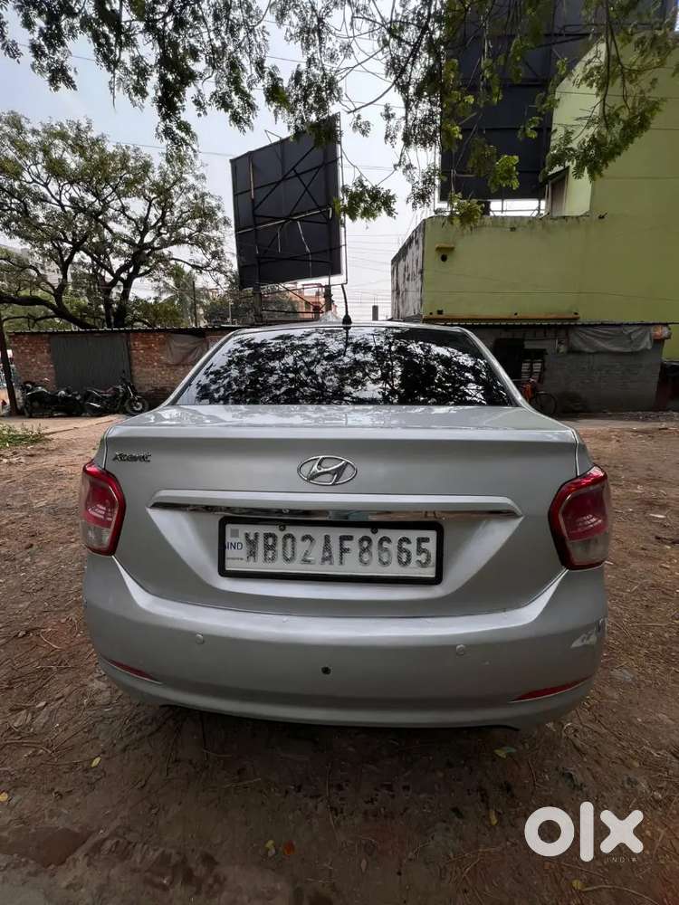 Hyundai Xcent 2014 Tax 2029