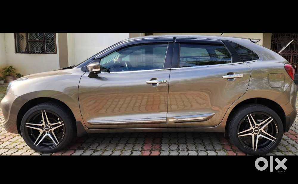 Baleno Showroom Condition Only 20000 Km Running Fully Loaded.
