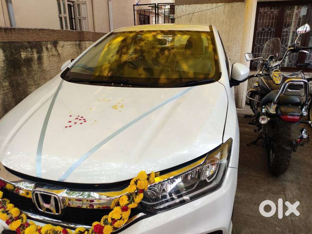 White Honda City Regd. On 11.01.2019