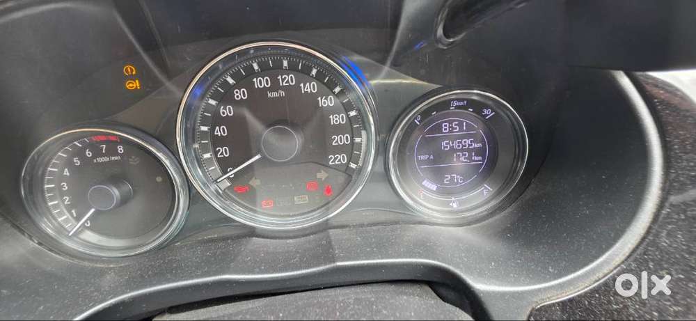 Honda New City V (petrol + Cng) Golden Brown