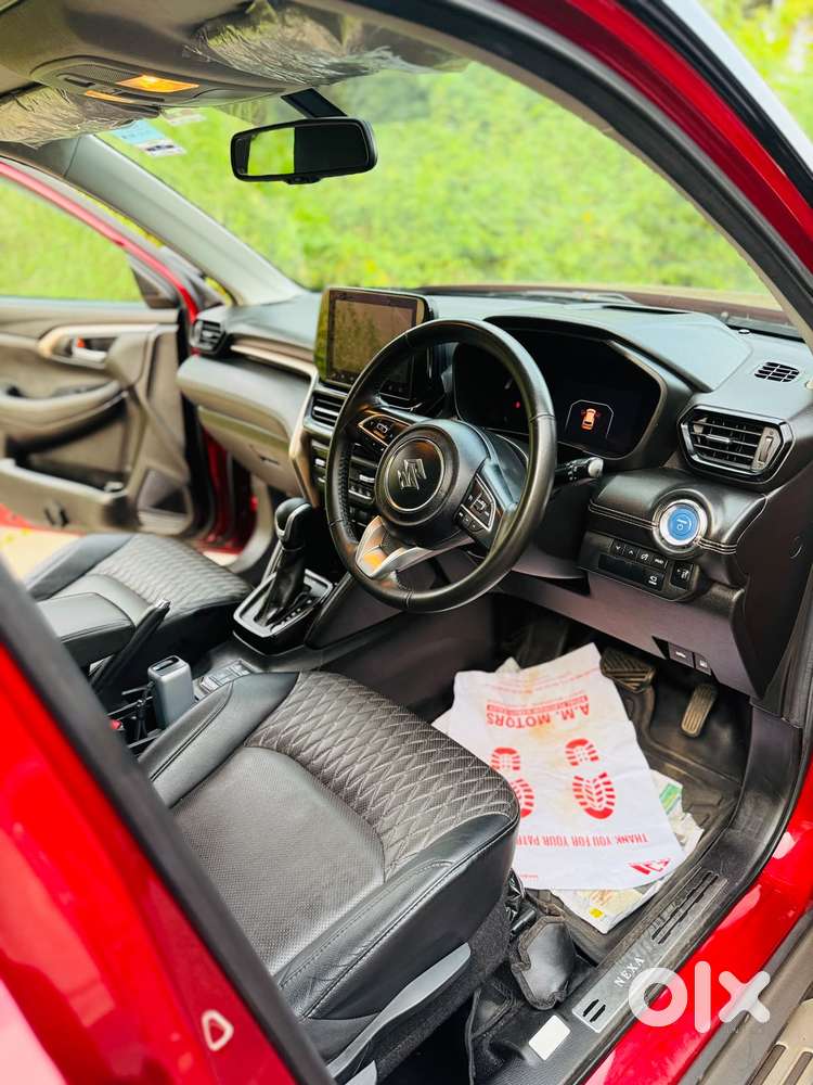 Maruti Suzuki Grand Vitara 1.5 Zeta Plus Dual Tone Intelligent Hybri..