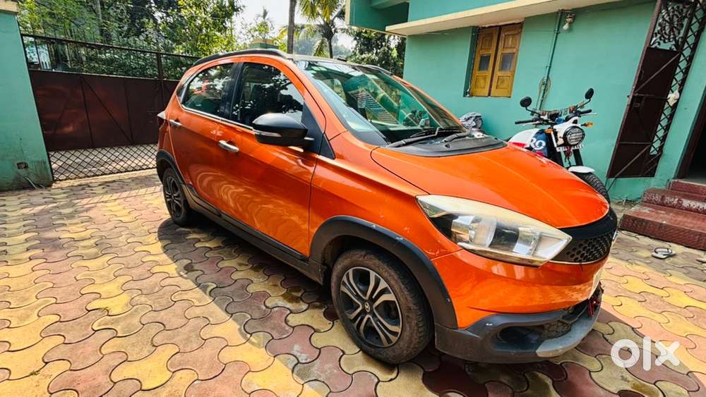 Tata Tiago Nrg Manual Petrol &ndash; Orange Colour &ndash; 66,647 Km Driven
