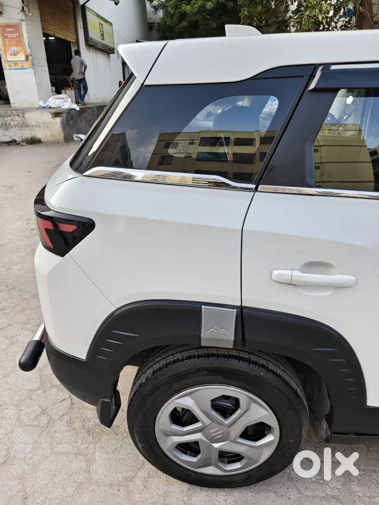 2025 Maruti Suzuki Brezza Lxi Petrol  5,000 Km  1st Owner