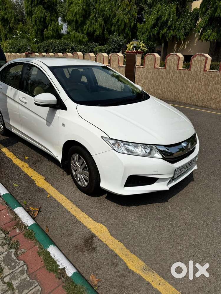 White Honda City - Officer Driven