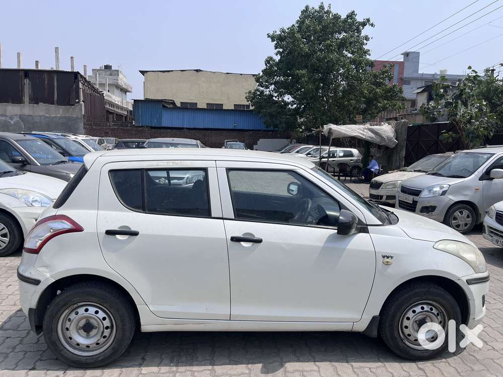 Maruti Suzuki Swift 1.2 Lxi (o), 2014, Petrol