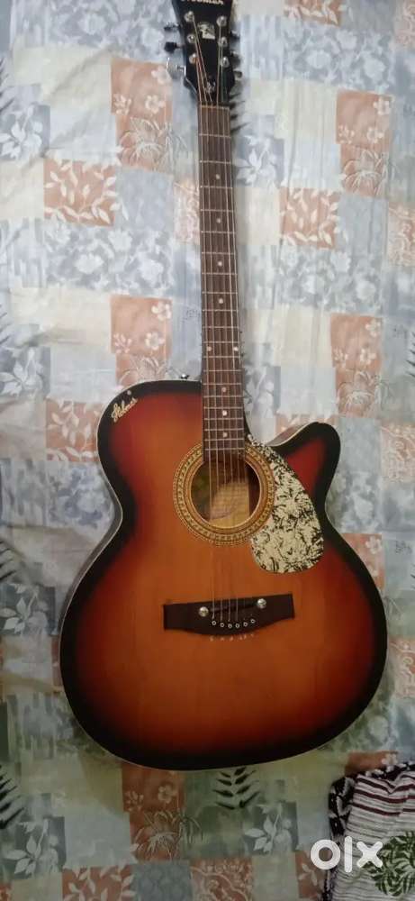 Guitar for sale good condition with cover and peek