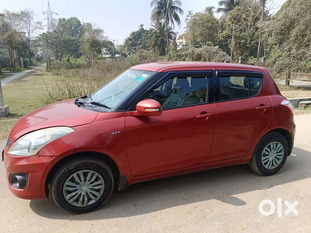 Maruti Suzuki Swift Hatchback Blazing Red Single Hand Used Year 2012
