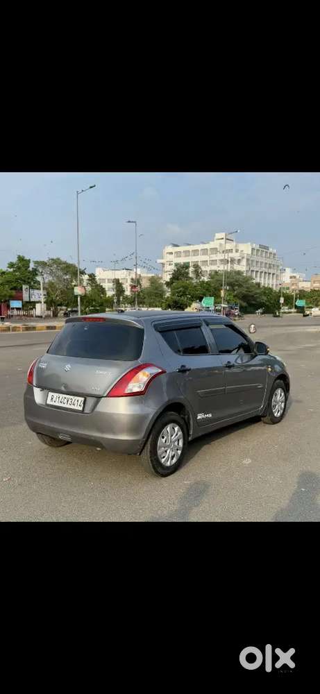 Maruti Suzuki Swift Lxi 2014