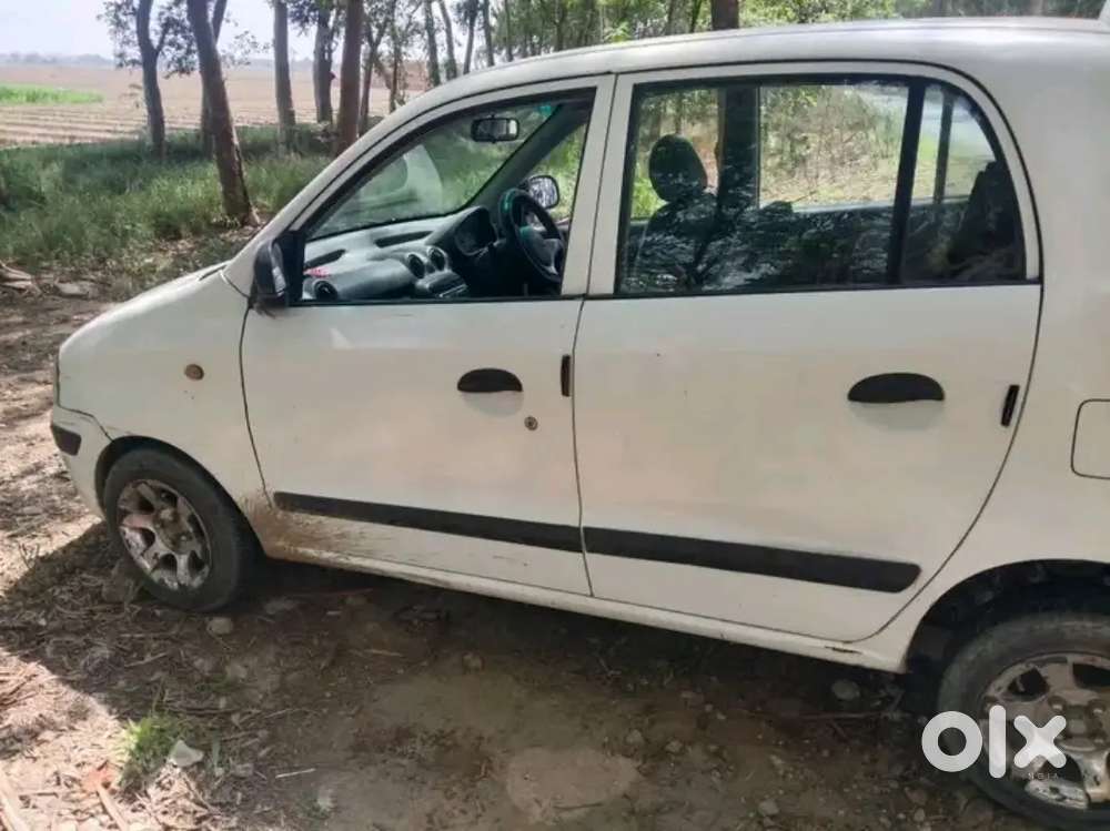 Top Modal Santro Xing Gls 2009 Petrol