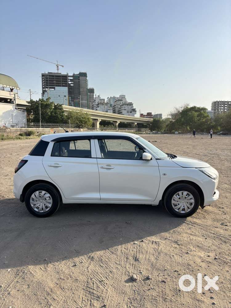 Maruti Suzuki Swift 1.2 Lxi (o), 2024, Petrol