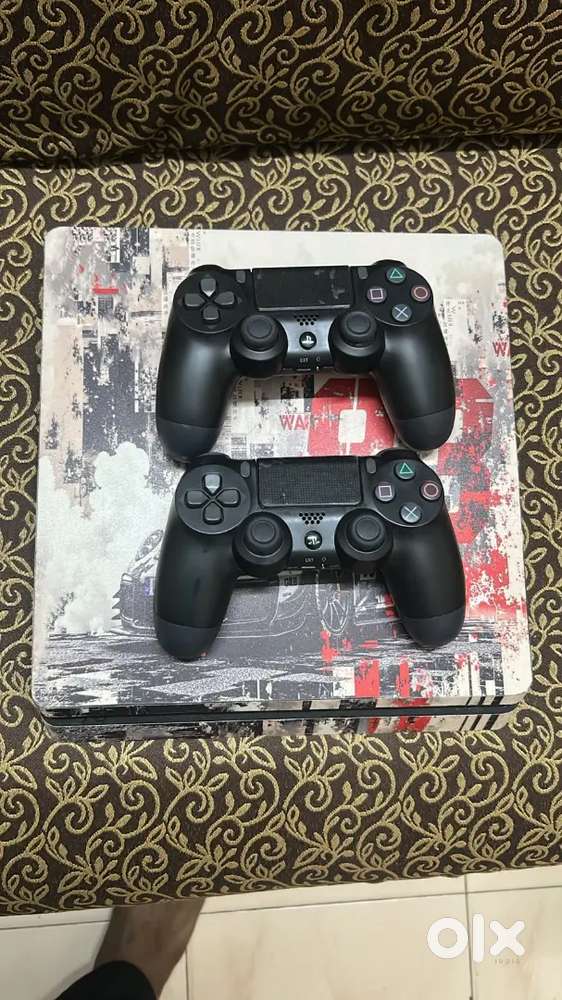 Ps4 Silm PlayStation Silm 1tb with few games full Box kit