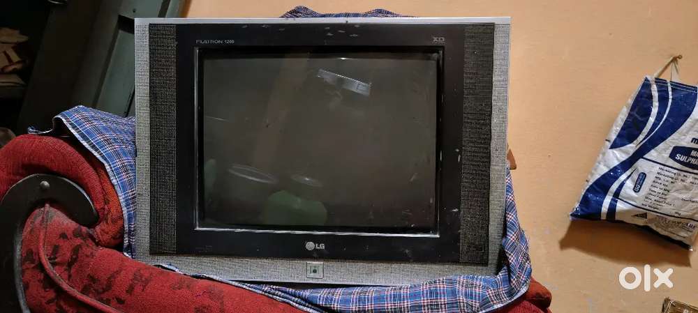 LG TV with remote available for sale. TV is in good working condition