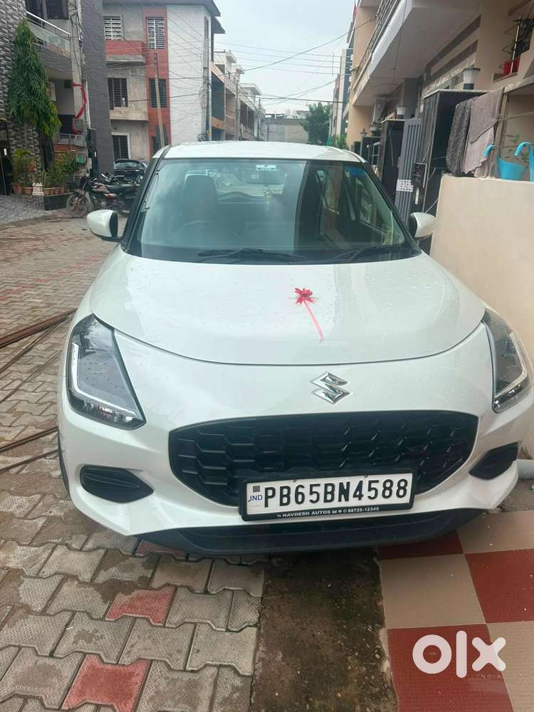 Maruti Suzuki Swift Vxi 2026