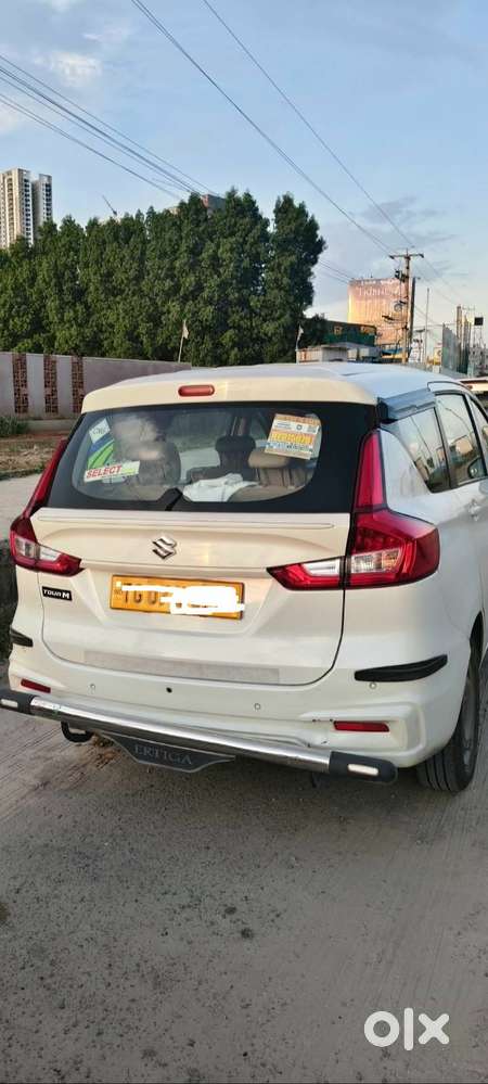 White Maruti Suzuki Ertiga Tour M