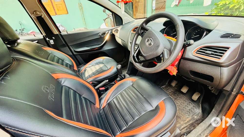 Tata Tiago Nrg Manual Petrol &ndash; Orange Colour &ndash; 66,647 Km Driven