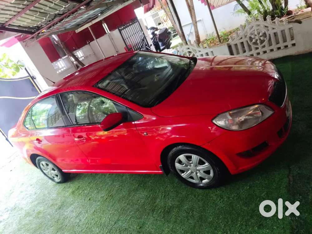 Skoda Rapid Red Color . Doctor Owned,best Condition.all Services Done