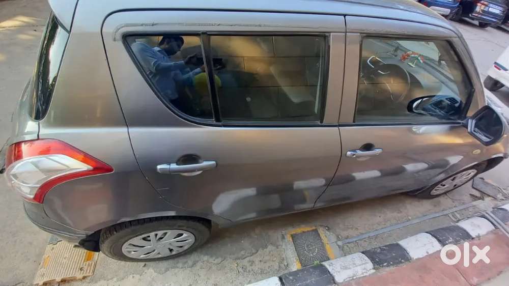Maruti Suzuki Swift Lxi 2016