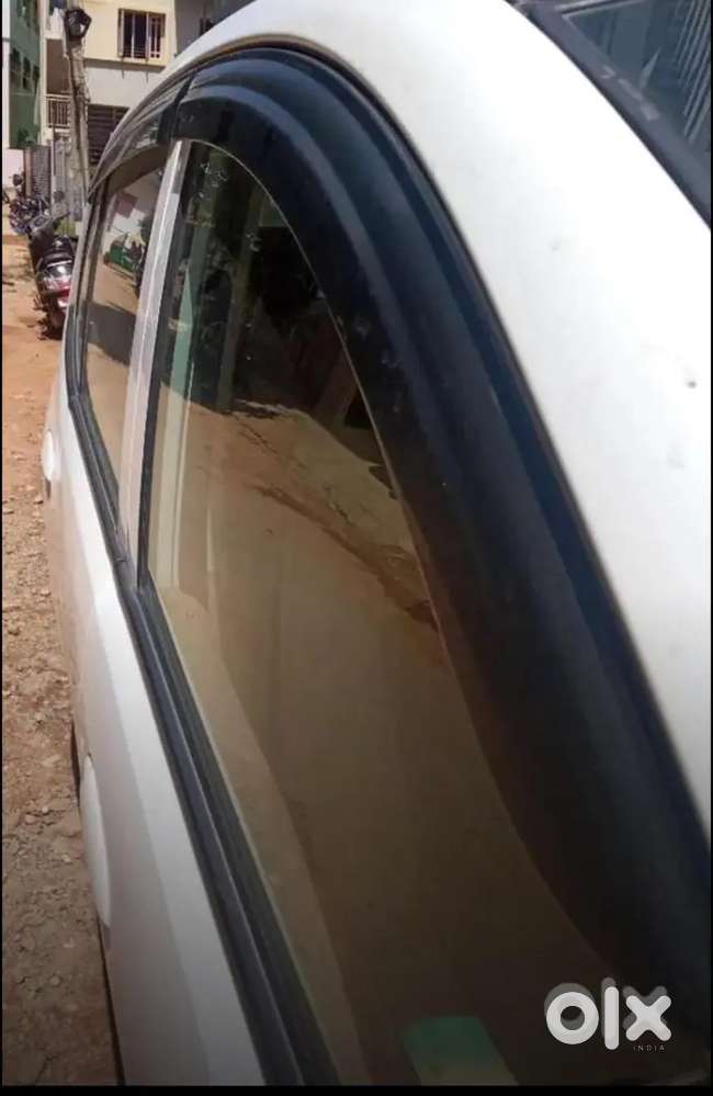 Hyundai I10/ 2009/petrol/white/92,000 Kms/ Call (8x1x2x3x1x3x8x8x2x1)