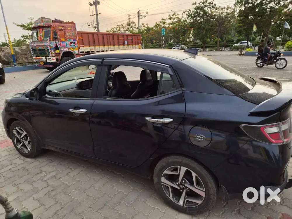 Hyundai Aura 2023 Petrol 98000 Km Driven