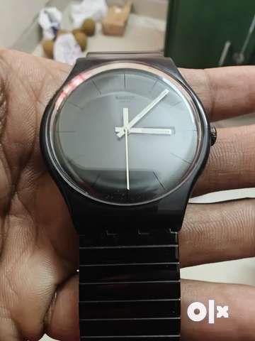 Swatch mystery best sale life black