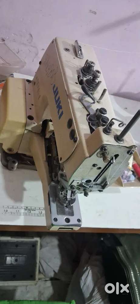 Kaaj button machine