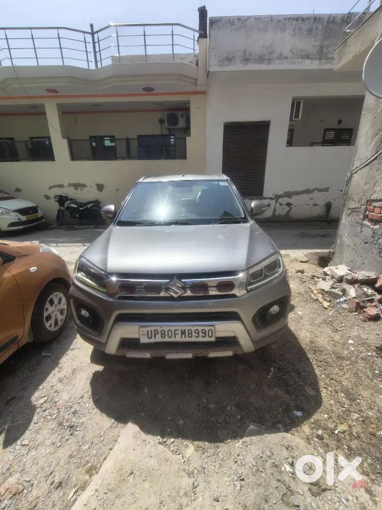 Maruti Brezza Zxi + Primium Silver Colour Excellent Condition.