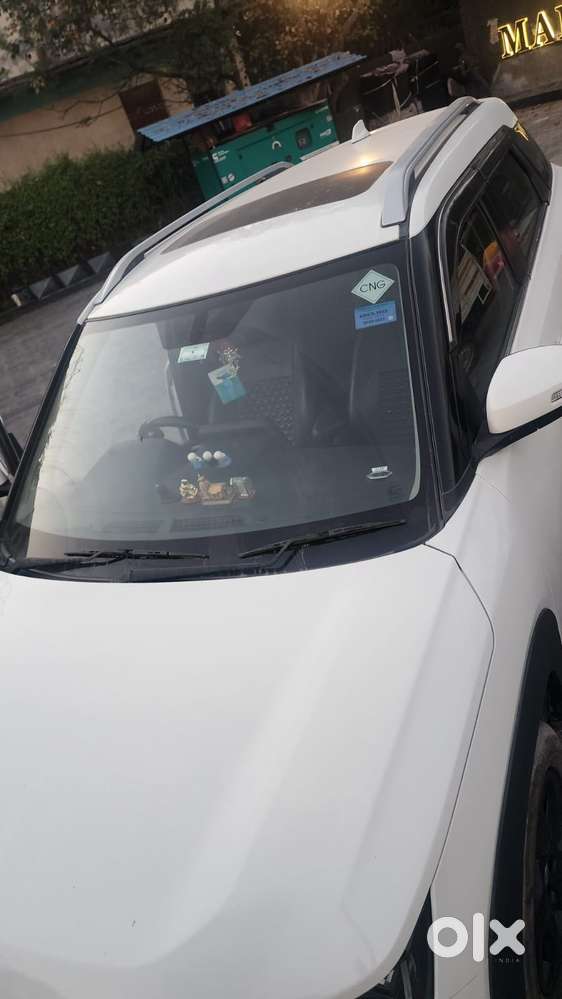 Maruti Suzuki Brezza 1.5 Zxi Cng Dual Tone, 2023, Cng & Hybrids