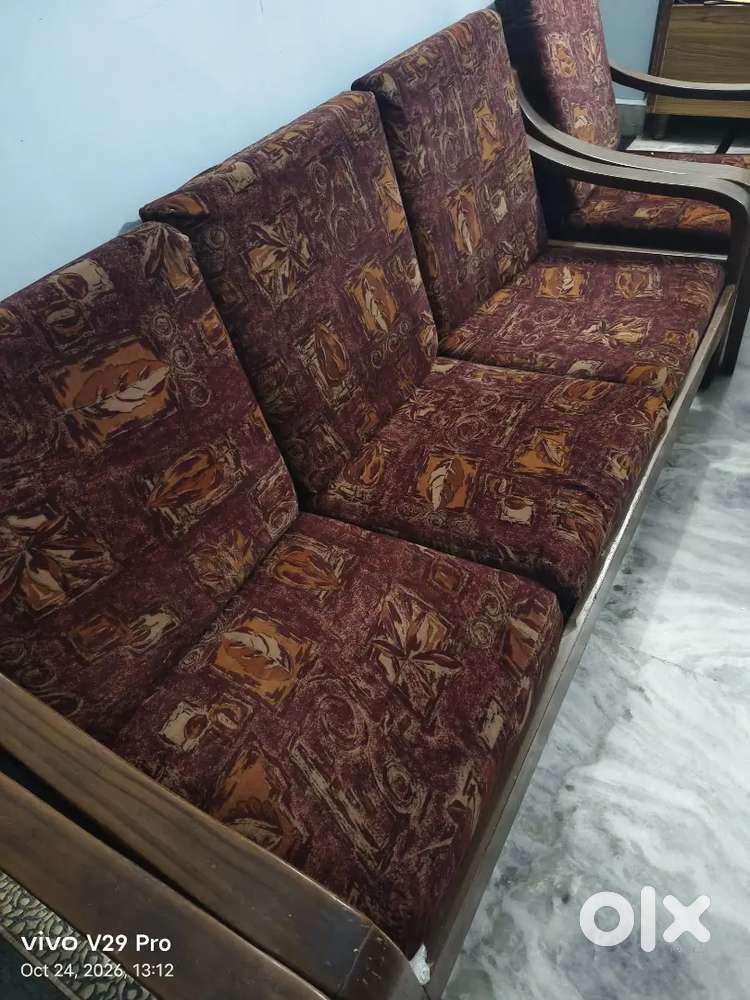 Wooden 5 seater sofa nice brown in colour , with foam gaddi ,