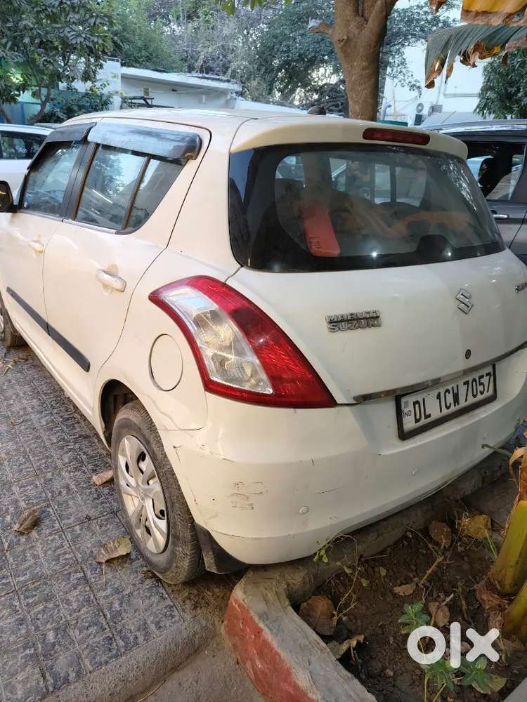 Swift Lxi 2027 White Color Good Condition.