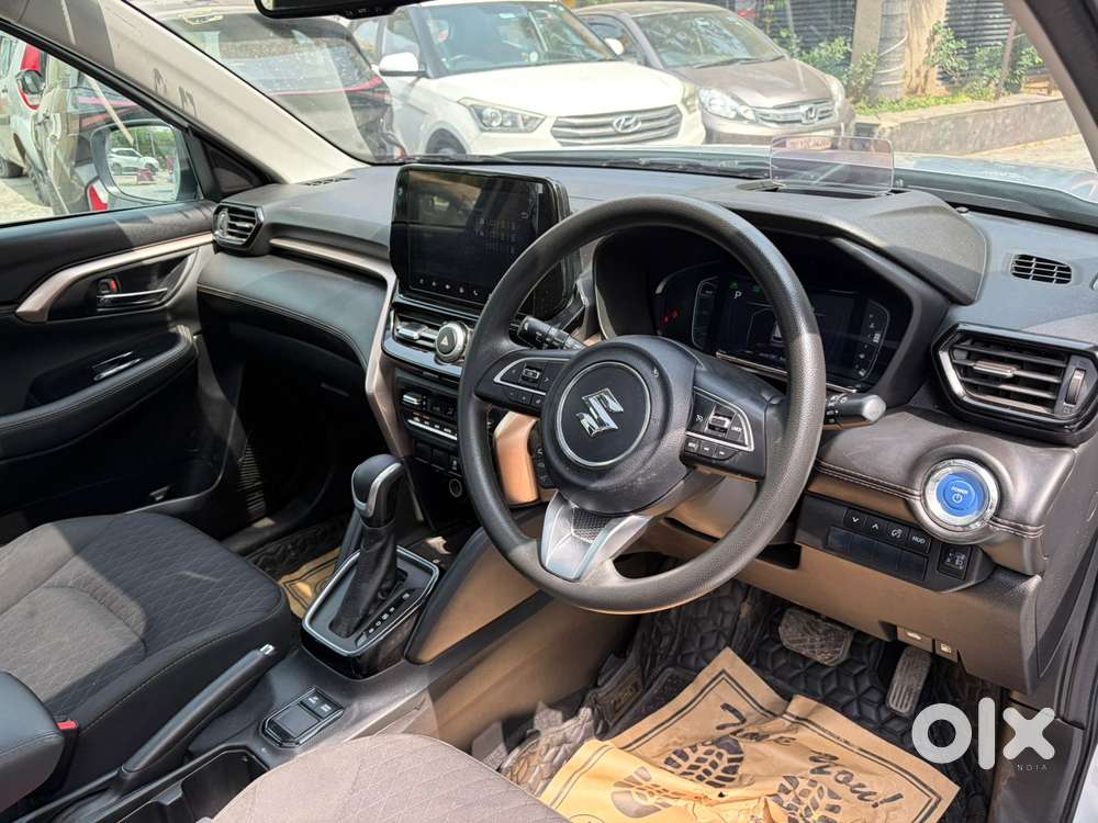 Maruti Suzuki Grand Vitara 1.5 Zeta Plus Dual Tone Intelligent Hybri..