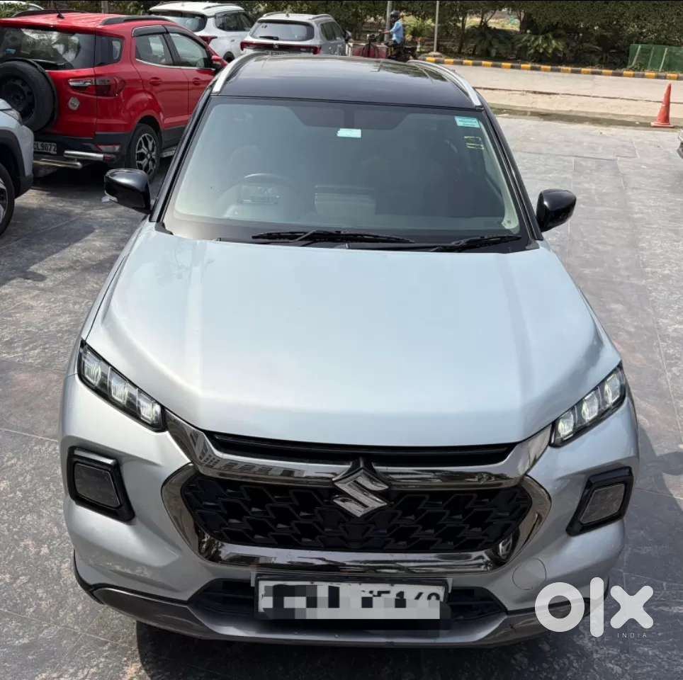 Maruti Suzuki Grand Vitara 1.5 Zeta Plus Dual Tone Intelligent Hybri..