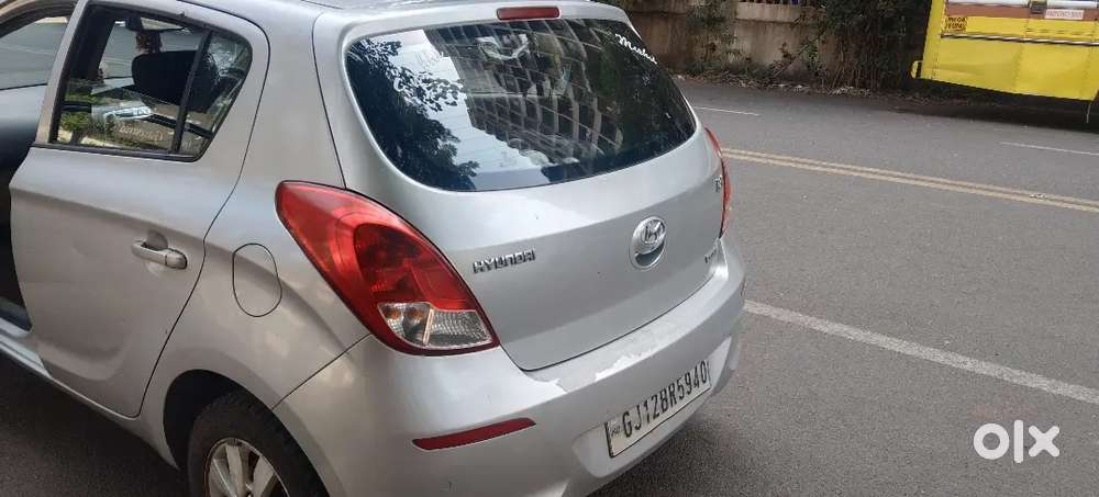 I20, 2nd Owner, Gujrat Registration, Petrol, Sportz ,silver Color,.