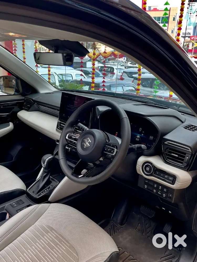 Maruti Suzuki Victoris Zxi +