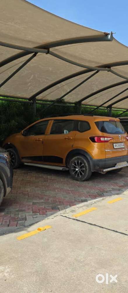 Mustard Colour Renault Triber With 15inch Alloy Wheels