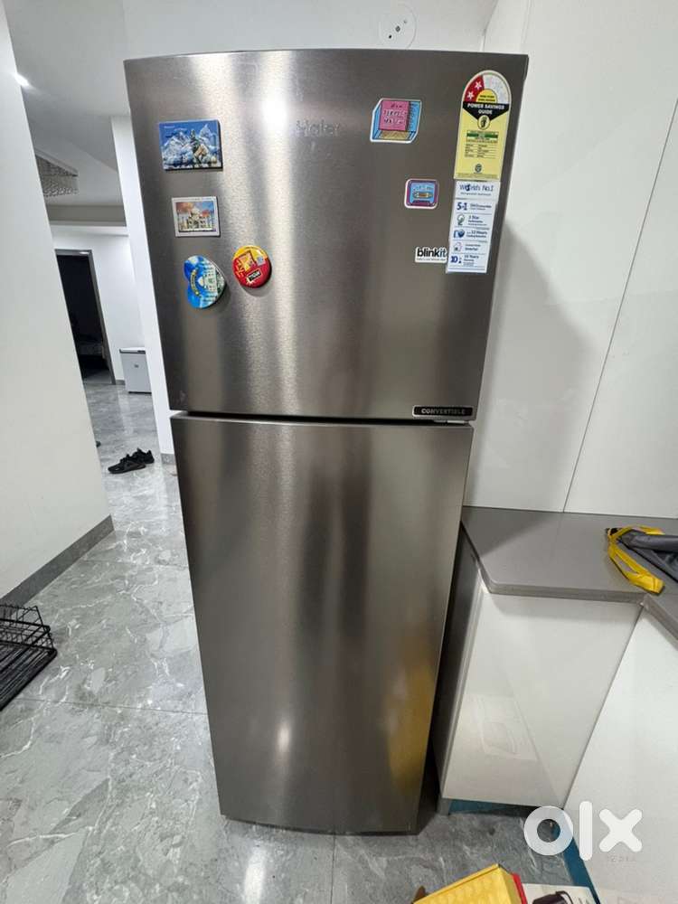 silver Haier frost-free refrigerator with a 268-liter capacity