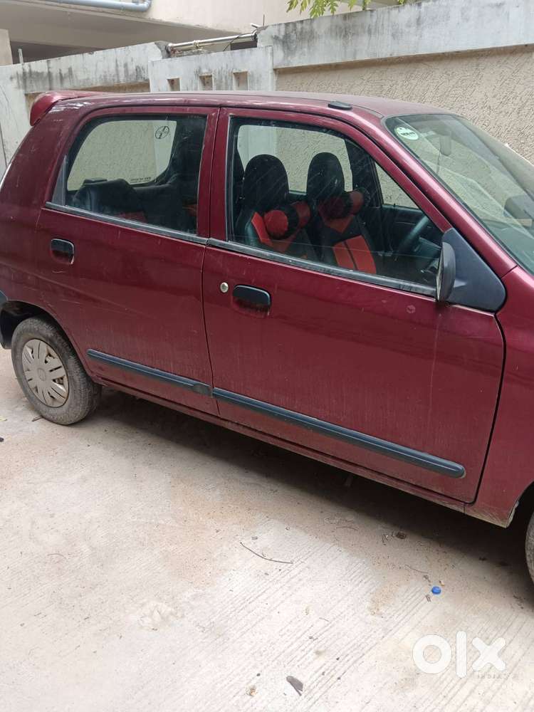 Brick Red Maruti Alto