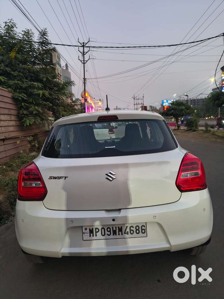 Maruti Suzuki Swift 1.2 Lxi (o), 2022, Petrol
