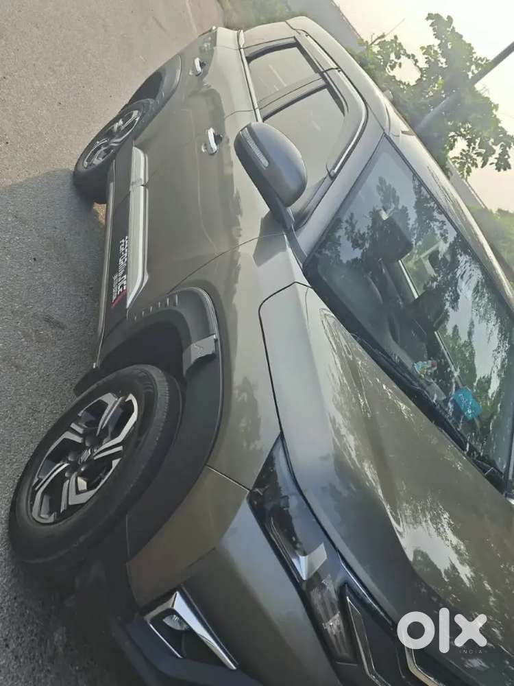 Maruti Suzuki Brezza Petrol Lxi 2025 March