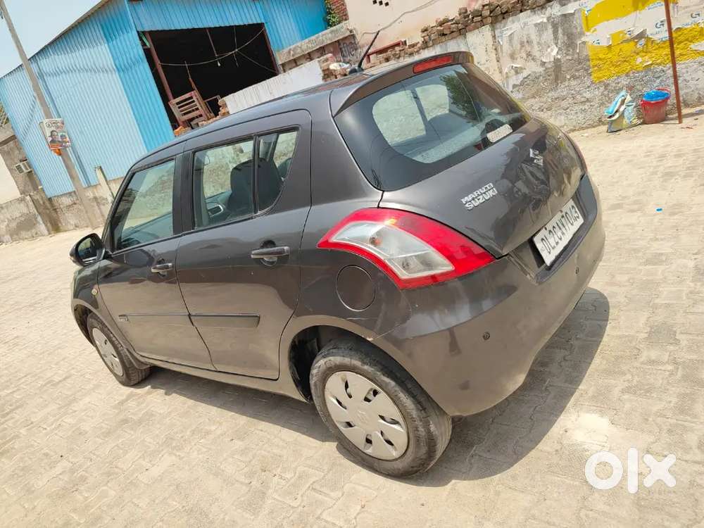 Maruti Suzuki Swift Lxi 2016