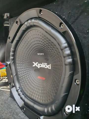 Olx car store subwoofer and amplifier