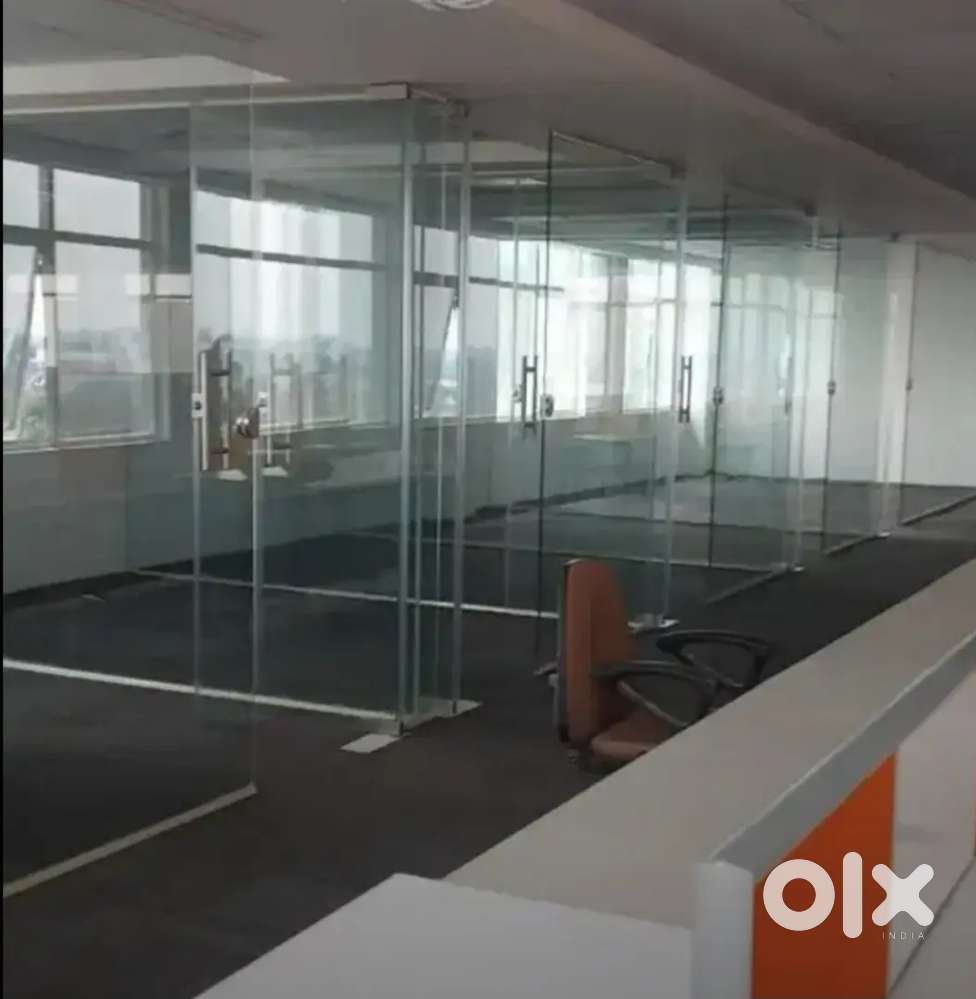 Glass partition work. Office workstation. Floor mats. Almunium work