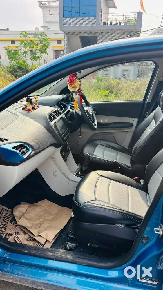 This Is The Top Model Tata Tiago  It's A New Car Driveen Only 9000 Km