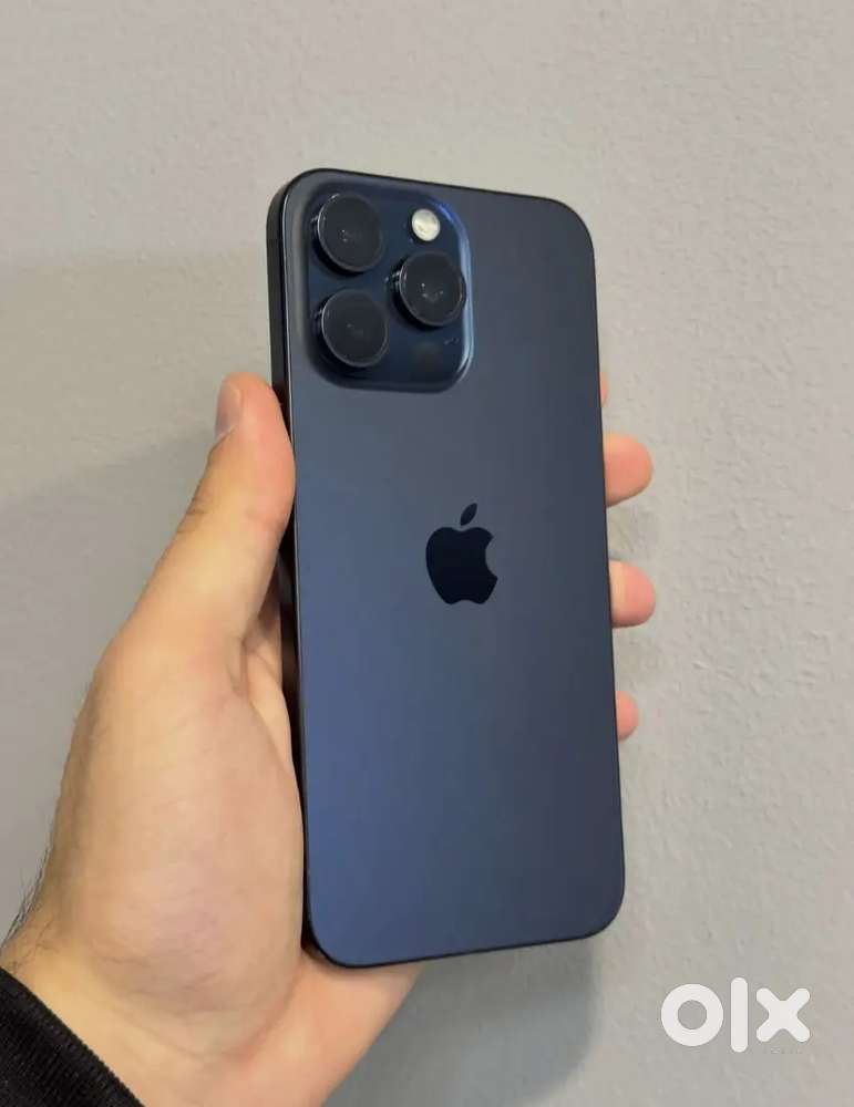 Iphone 15 pro in blue titanium color with zero scratches under waranty