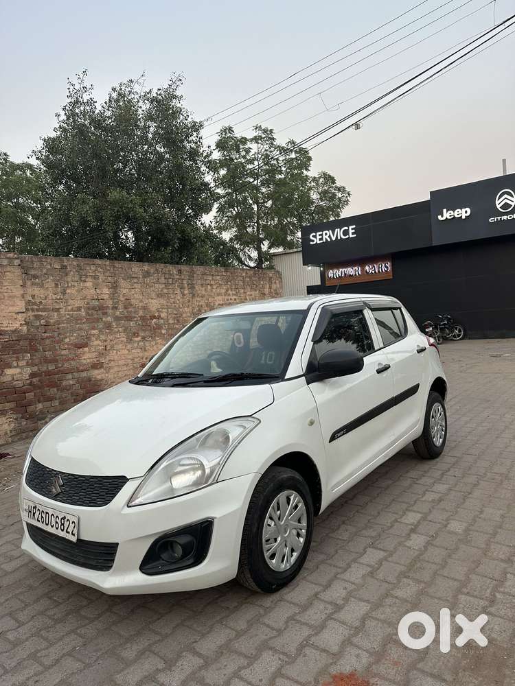 Maruti Suzuki Swift Lxi Optional-o, 2017, Petrol