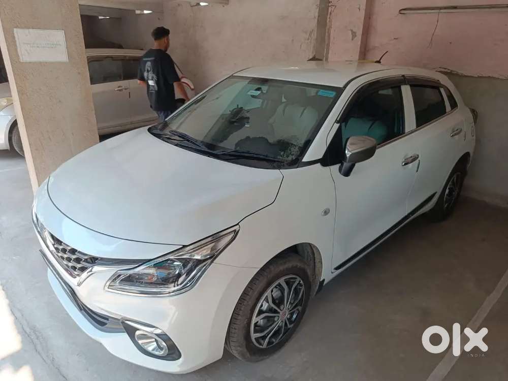 2024 Maruti Suzuki Baleno Sigma &ndash; White &ndash; First Owner